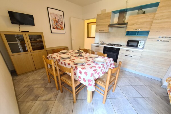 Ruim appartement met balkon op 150 meter van het strand in Rosolina Mare - thumbnail 2
