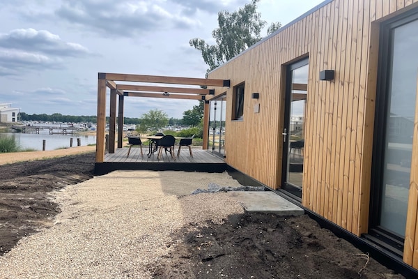 Luxe lodge met uitzicht op strand en water in Well - thumbnail 3