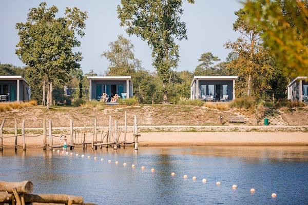 Sfeervol chalet met uitzicht op strand en haven in Well, Limburg - thumbnail 6
