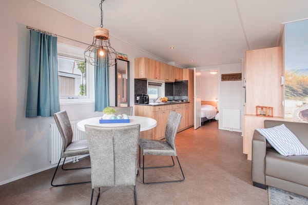 Sfeervol chalet met uitzicht op strand en haven in Well, Limburg - thumbnail 2