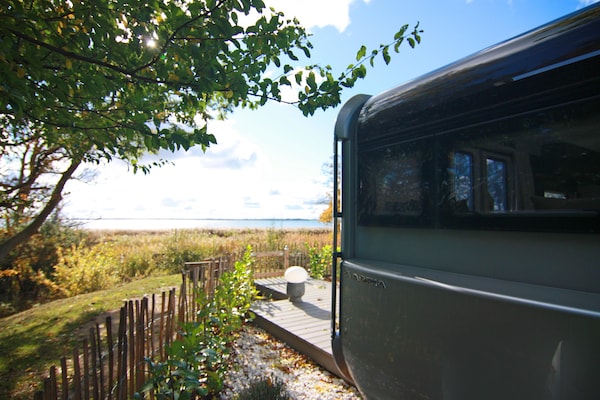 Glamping stacaravan Dreamer met uitzicht op het Achterwasser - thumbnail 6