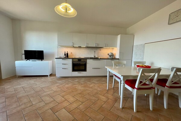 Gelijkvloers appartement aan golfbaan met panoramisch uitzicht op Toscane - thumbnail 4