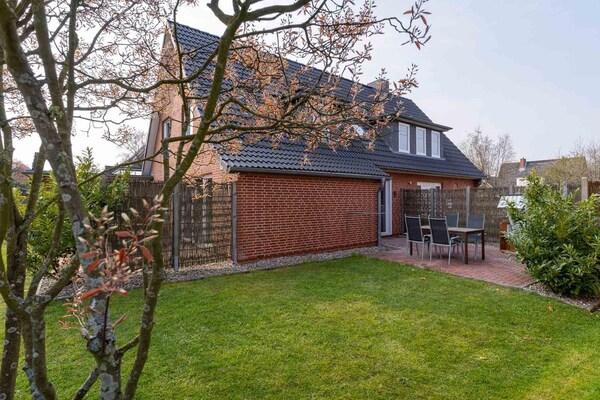 Dünenzauber: Modern appartement met tuin, vlakbij centrum en strand - thumbnail 1