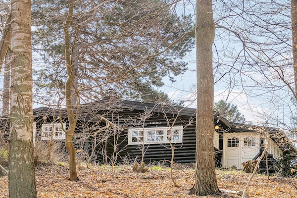 Rustiek vakantiehuis Bjælkely in het bos bij Frederiksværk - thumbnail 3