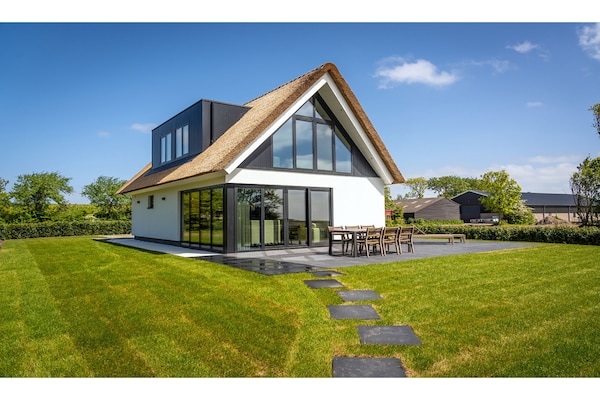 Luxe villa bij De Cocksdorp met uitzicht op vuurtoren en Waddenzee - thumbnail 2