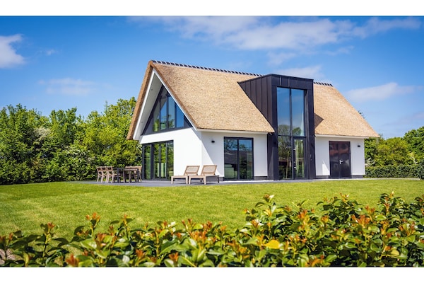 Luxe villa bij De Cocksdorp met uitzicht op vuurtoren en Waddenzee - thumbnail 4