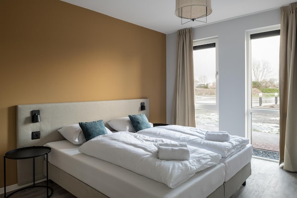 Modern vakantiehuis aan de kreek, 1,2 km van zee in Resort Nieuwvliet-Bad - thumbnail 4
