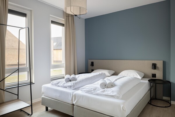 Luxe vrijstaand vakantiehuis met 3 suites op Resort Nieuwvliet-Bad - thumbnail 4