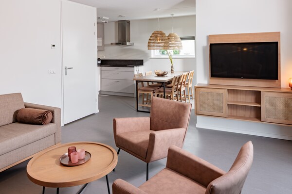 Modern vakantiehuis met 3 suites op autovrij Duinresort, 4,5 km van zee - thumbnail 4