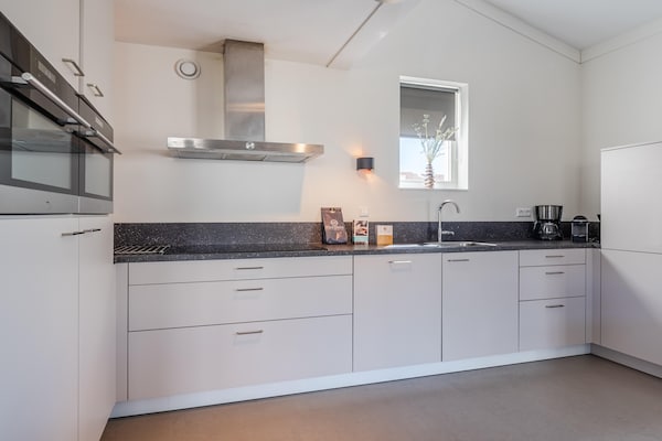 Ruime moderne villa voor 12 personen in Noordwijkerhout - thumbnail 4