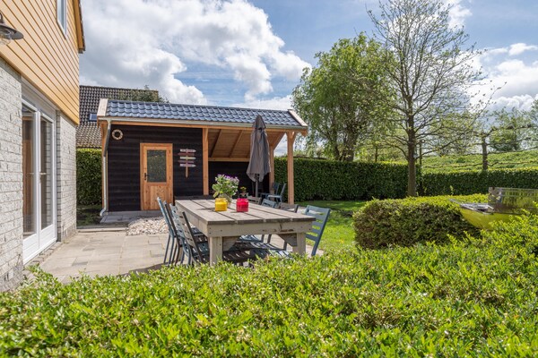 Halfvrijstaande villa met sauna op 300m van zee in Wemeldinge - thumbnail 1