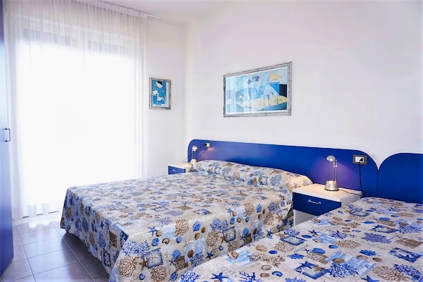 Licht appartement met zwembad op 500m van strand in Porto Santa Margherita - thumbnail 2