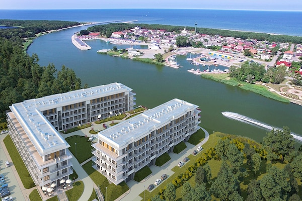 Ruim appartement aan de Dziwna met zwembad en sauna, 700m van strand - thumbnail 1
