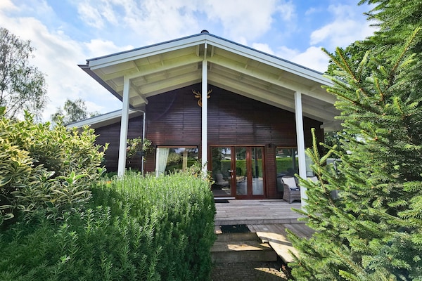Chalet Kieftveen: Luxe vakantiehuis op de Veluwe met omheinde tuin - thumbnail 1