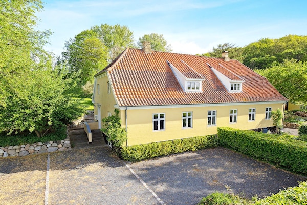 Licht vakantiehuis bij Tranekær met uitzicht op velden en wilde paarden - thumbnail 2