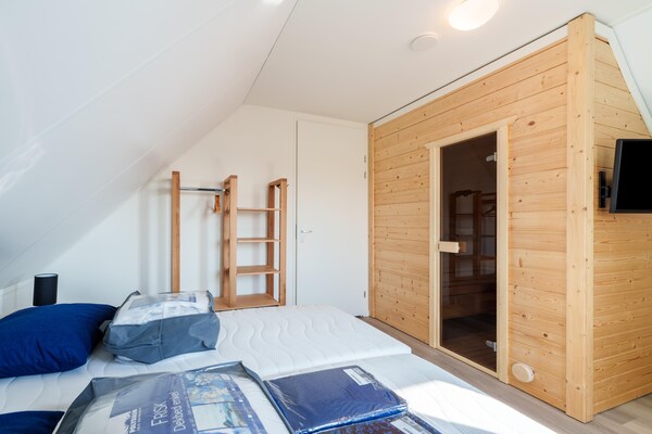 Vrijstaand vakantiehuis met sauna aan het meer in Simonshaven - thumbnail 6