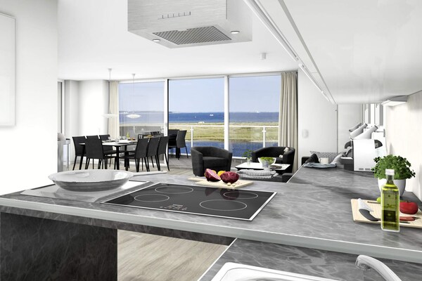Luxe appartement aan het water met sauna, stoomdouche en panoramisch zeezicht - thumbnail 4
