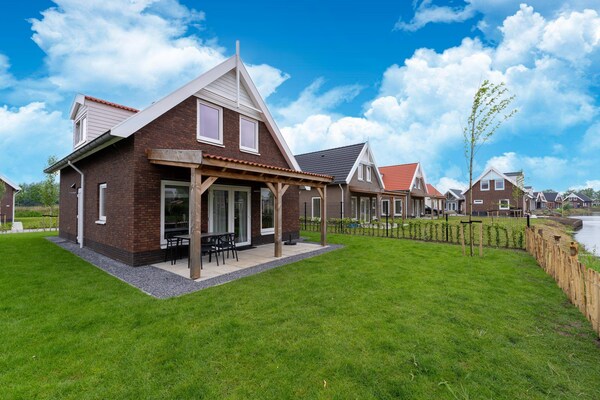 Strandloper 129: Luxe vakantiehuis aan het water met tuin, voor 5 personen - thumbnail 6