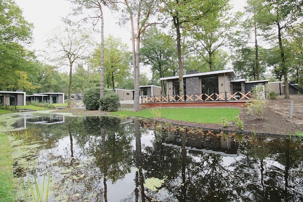 Luxe boshuis met vijverzicht op de Veluwe, huisdieren welkom - thumbnail 6