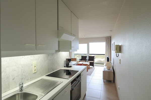 Knus appartement op 2e verdieping met balkon, vlakbij strand en golfbaan - thumbnail 2