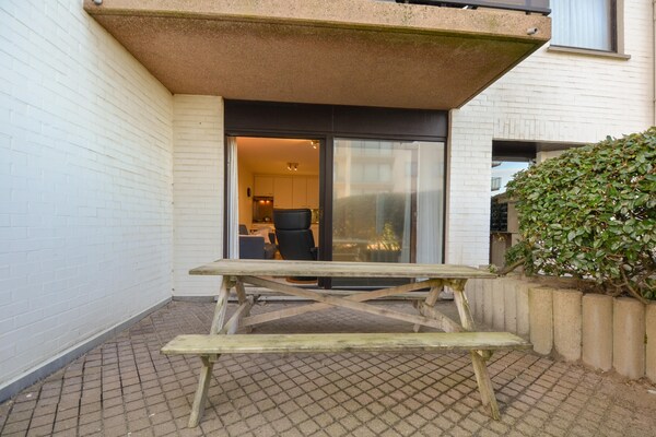 Licht appartement met zonneterras op loopafstand van strand en duinen - thumbnail 6