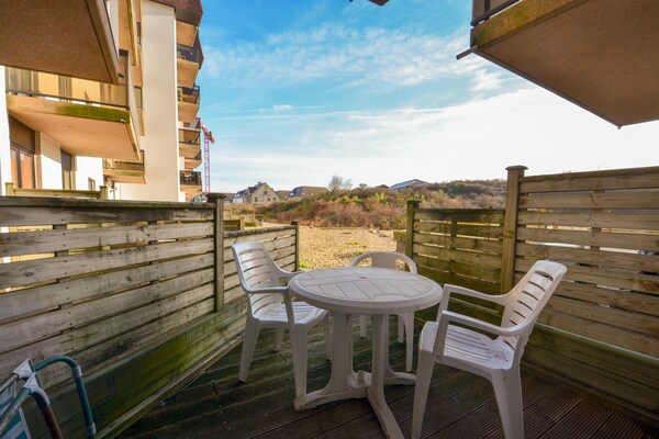 Licht appartement met zonneterras op loopafstand van strand en duinen - thumbnail 5