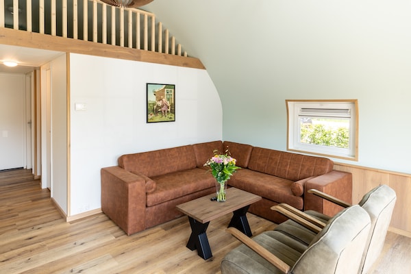 Modern landhuis met sauna op bosrijk vakantiepark in Baars - thumbnail 2