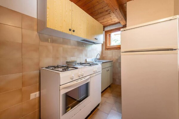 Licht appartement met tuin op 150 meter van zee in Pittulongu - thumbnail 3