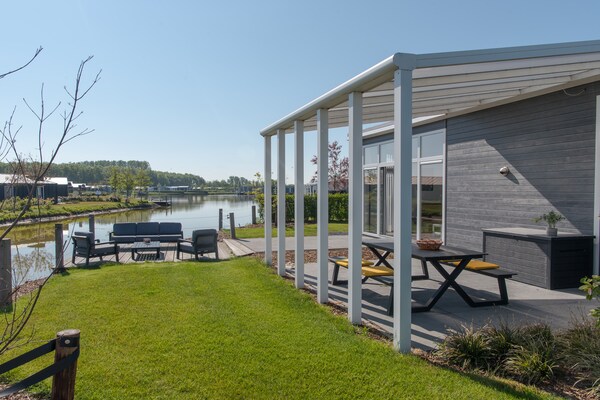 Modern vakantiehuis met overdekt terras aan de Oosterschelde in Wemeldinge - thumbnail 6