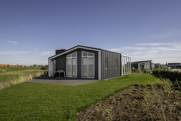 Water Resort Oosterschelde 55: Modern vakantiehuis aan de dijk in Zeeland - thumbnail 6