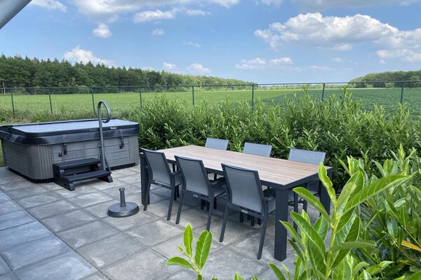 Luxe wellnessvilla aan water in Drenthe met privé hottub - thumbnail 4