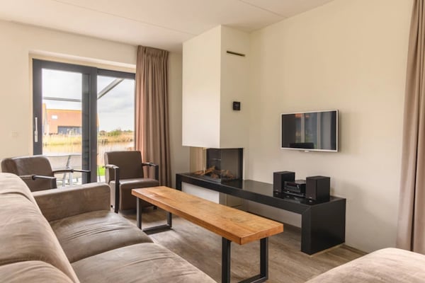 Modern vakantiehuis aan rustig recreatiemeer in Langelille - thumbnail 2