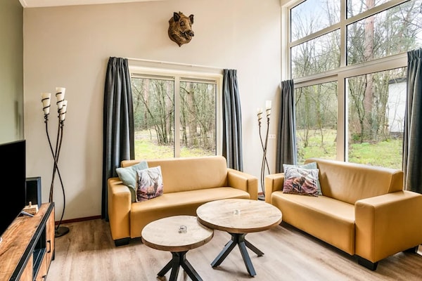 Comfortabele bungalow met sauna op de Veluwe, omgeven door bos - thumbnail 1
