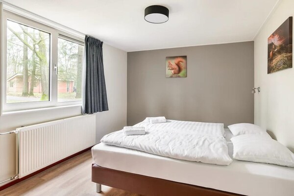 Comfortabele bungalow met sauna op de Veluwe, omgeven door bos - thumbnail 5