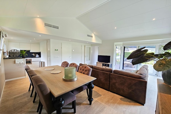 Bamboo House op de Veluwe: wellnessvilla aan rustig water voor 7 personen - thumbnail 4