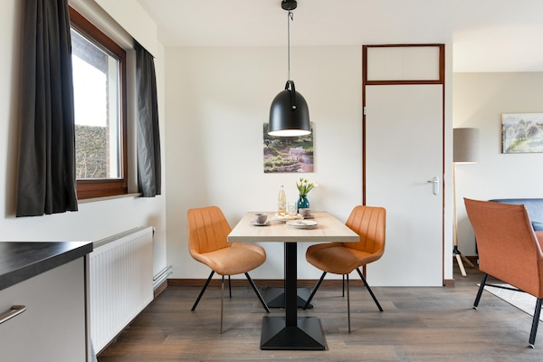 Knusse vrijstaande bungalow in bosrijk Zuid-Limburg met golfbaan - thumbnail 3
