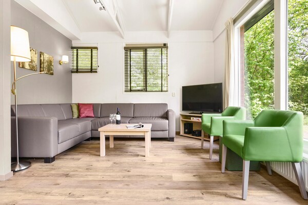 Groepsbungalow met 4 woningen op Veluws vakantiepark voor 16 personen - thumbnail 2