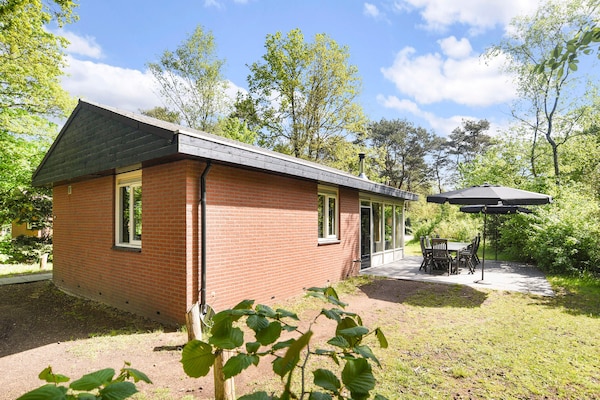 Groepsbungalow met 4 woningen op Veluws vakantiepark voor 16 personen - thumbnail 1