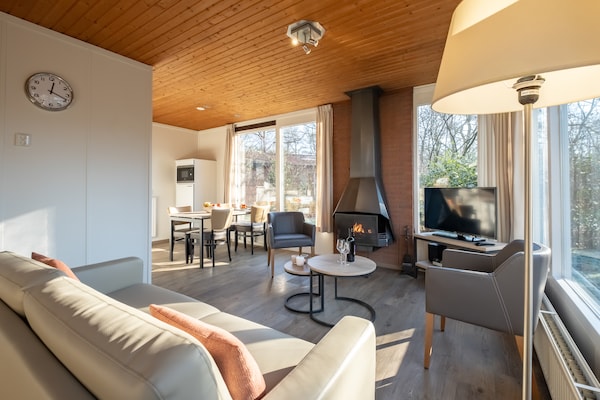 Vrijstaande bosbungalow op Parc Heihaas in Putten met open haard en hondvriendelijk terrein - thumbnail 4