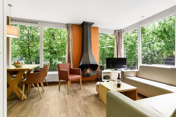 Vrijstaande bungalow met sauna op rustig vakantiepark in de Veluwe - thumbnail 3