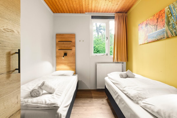 Vrijstaande bosbungalow in Putten voor 6 personen met haard en tuin - thumbnail 5