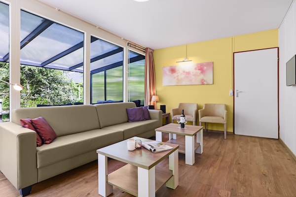 Vrijstaande bungalow voor 8 personen op bosrijk vakantiepark Parc Heihaas - thumbnail 3