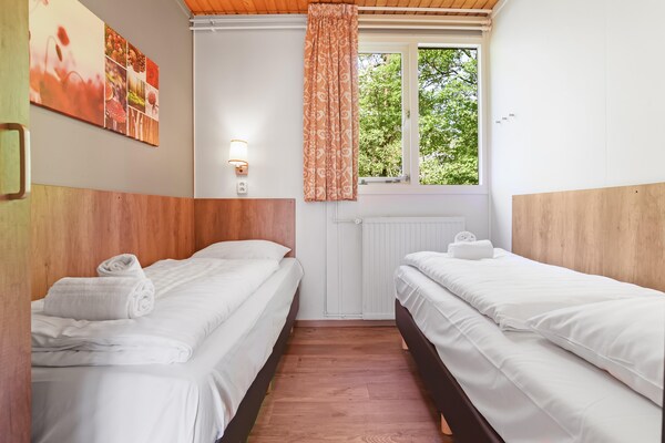 Vrijstaande bungalow voor 8 personen op bosrijk vakantiepark Parc Heihaas - thumbnail 6
