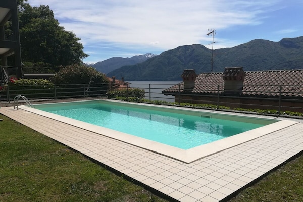 Modern appartement met zwembad en panoramisch uitzicht op het Comomeer - thumbnail 2