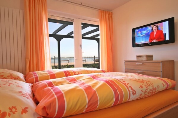 Licht appartement direct aan zee in Travemünde met terras en strandstoel - thumbnail 6