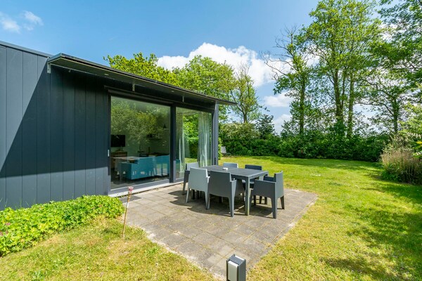 Bungalow Uitwaayer: modern vakantiehuis bij strand en bollenvelden - thumbnail 1