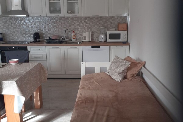 Rustiek appartement met twee slaapkamers en zeezicht nabij strand Slano - thumbnail 4