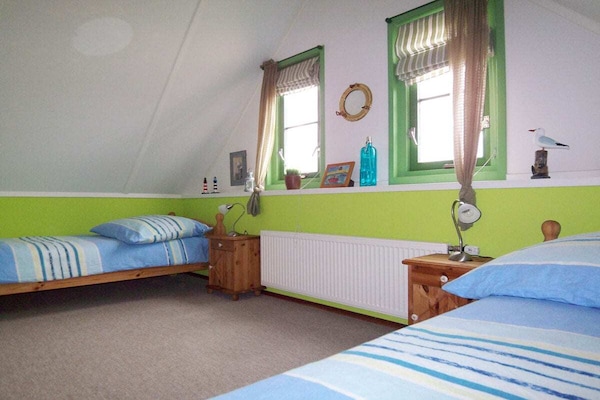 Luxe vakantiehuis met duinzicht op Strandslag in Julianadorp aan Zee - thumbnail 4