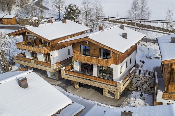 Luxe chalet aan de piste met privésauna in Neukirchen - thumbnail 4