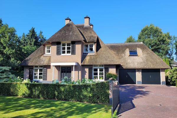 Wellnessvilla in Overloon met privésauna, tuin en dorp op loopafstand - thumbnail 5